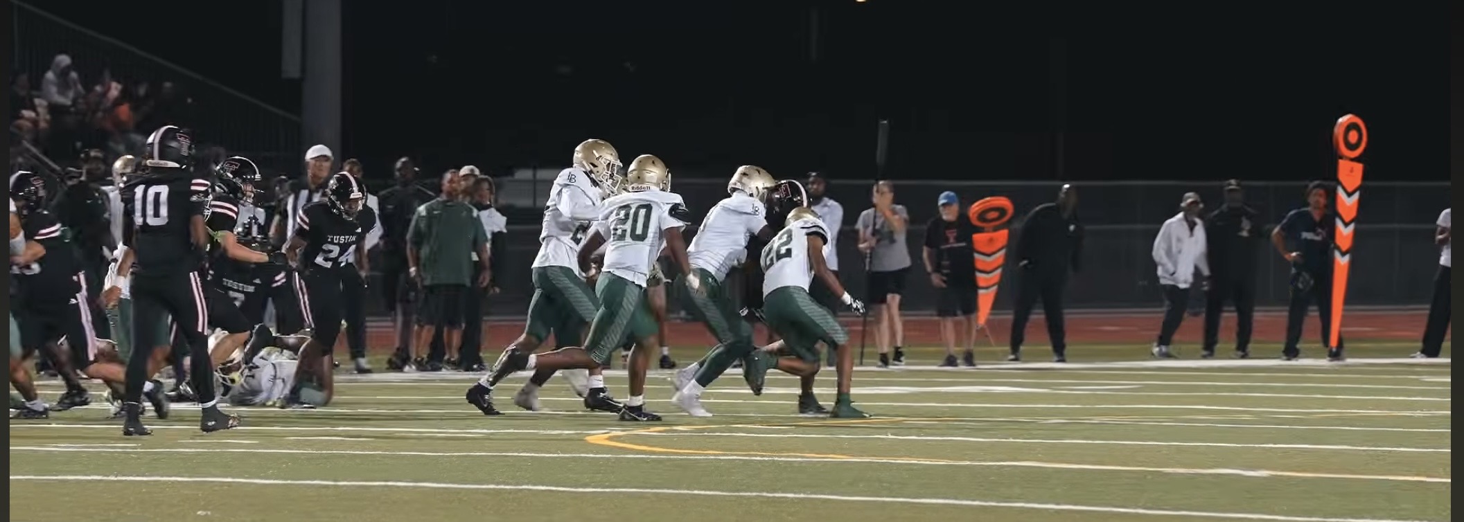 Ezra Rane Woodard number 22 flowing to the football