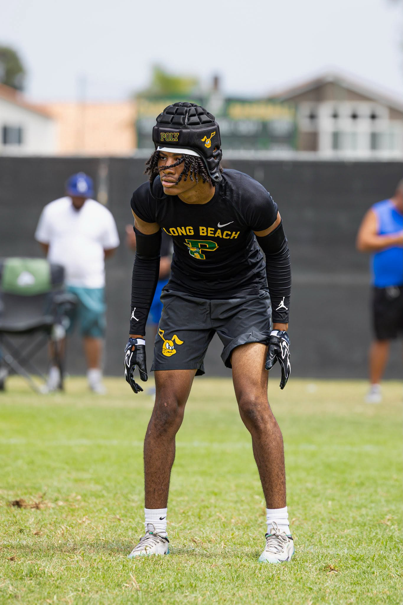 Ezra Rane Woodard in a defensive back stance during football training