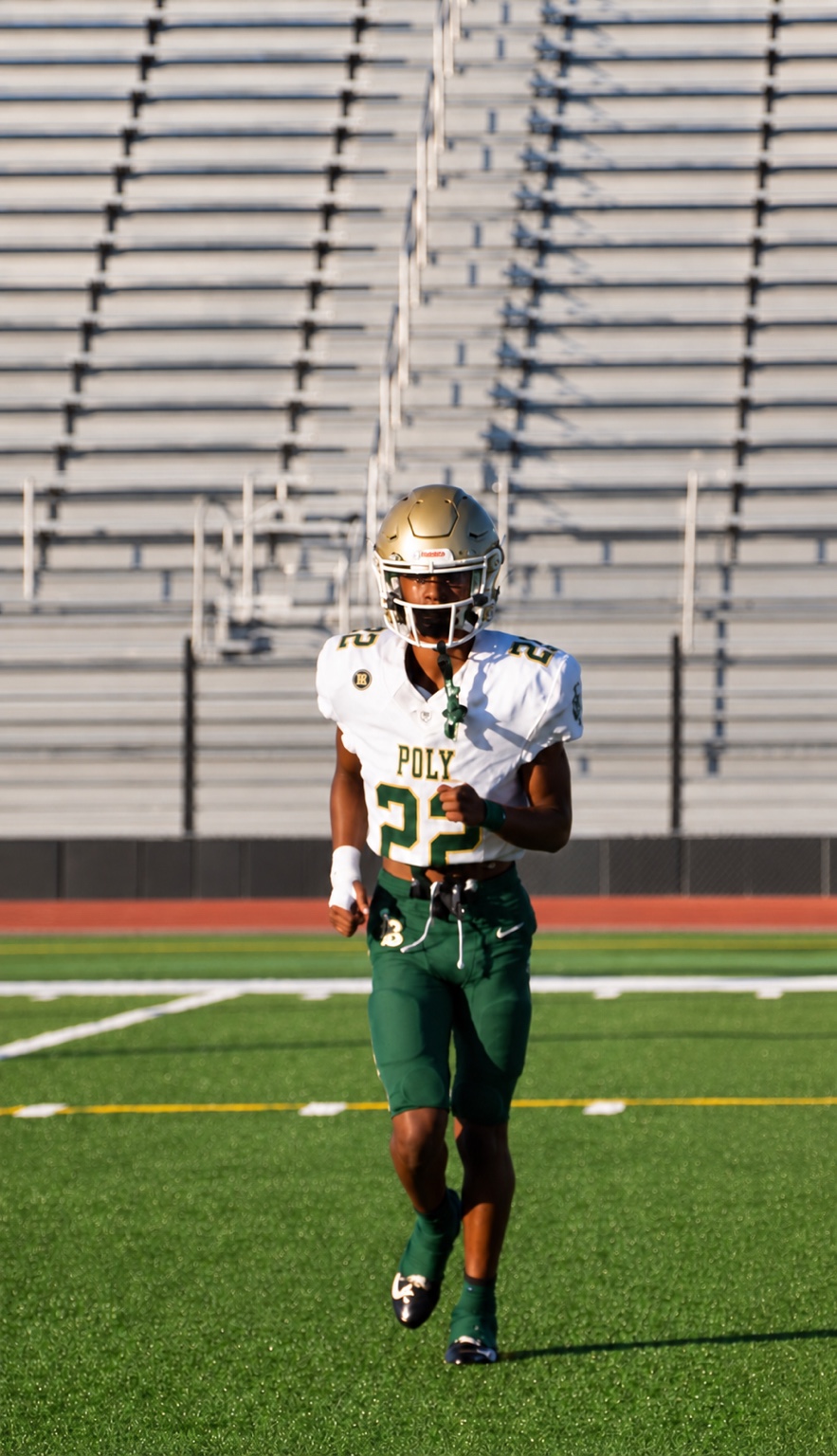 Ezra Rane Woodard number 22 alone on the football field